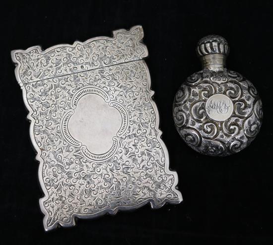 A Victorian silver card case and a small scent bottle